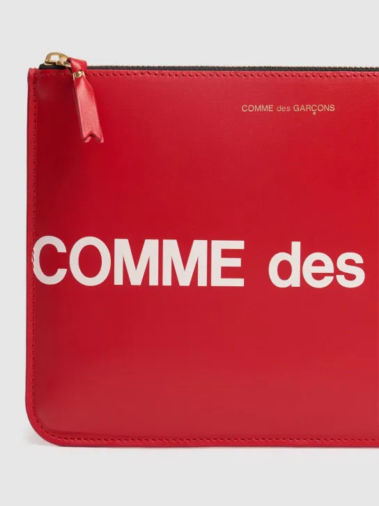 Comme des Garçons Wallet   Maxi logo leather pouch 